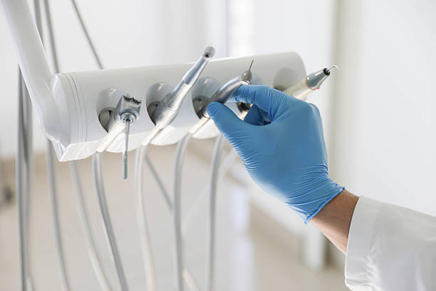 Professional Tooth Extraction technician working in Marinette, WI